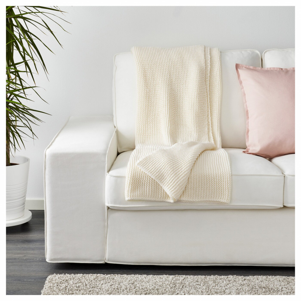 IKEA Ingabritta off-white throw on a white sofa