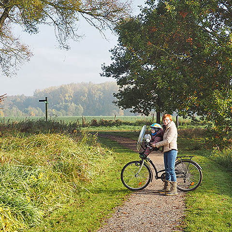 mother-and-son-using-bike