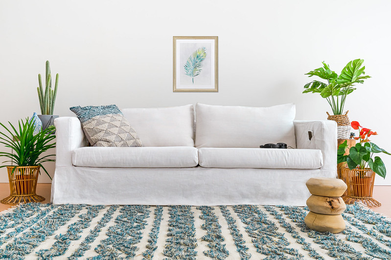 karlstad sofa in white linen slipcovers