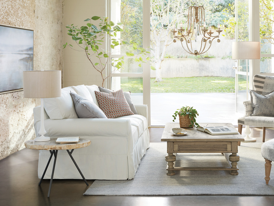 Traditional sofa  in an ornate farmhouse living room