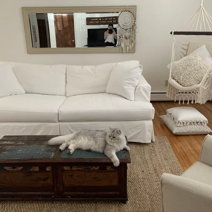 huge and deep white farmhouse slipcovered sofa