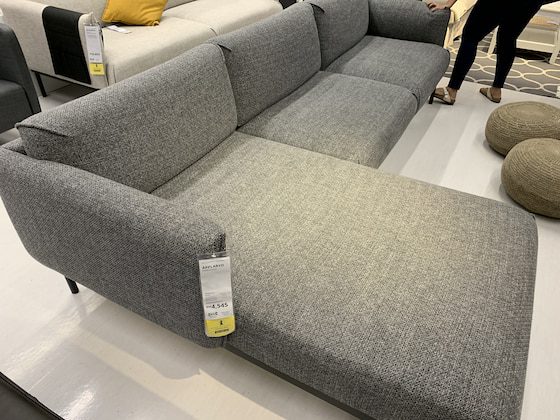 Grey IKEA Applaryd 3-seater sofa with chaise lounge in IKEA showroom