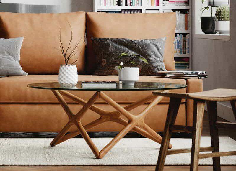 IKEA Friheten Schlafsofa mit Comfort Works Bezug aus veganem Leder in Wohnzimmer mit Holz und Glastisch