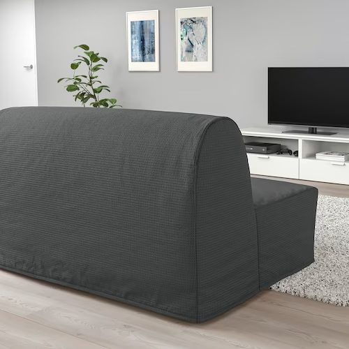 Schwarzes Schlafsofa im Wohnzimmer