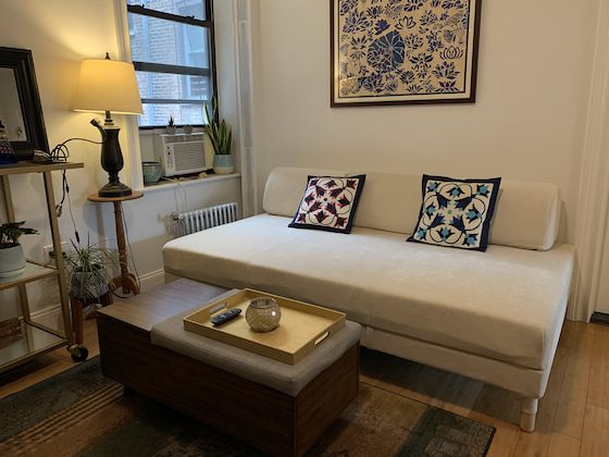 Beige sofa in a living room. 