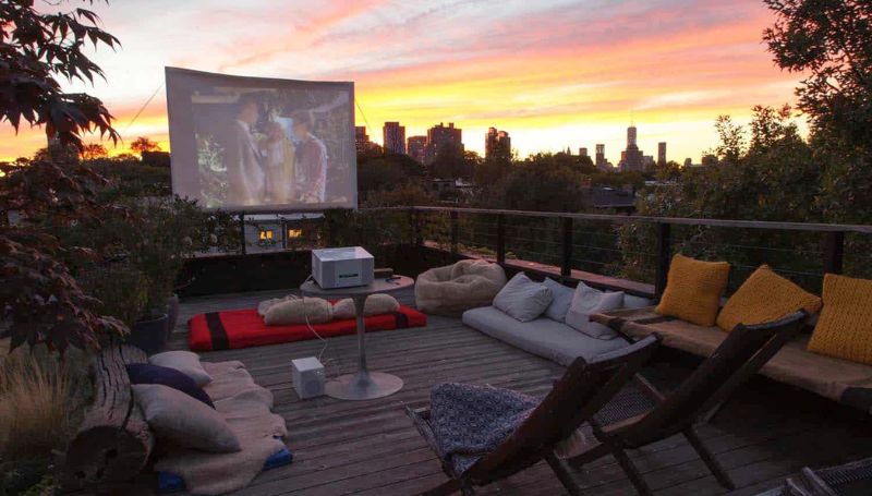 summer-outdoor-movie-screen-party-weatherproof-couch-cushions