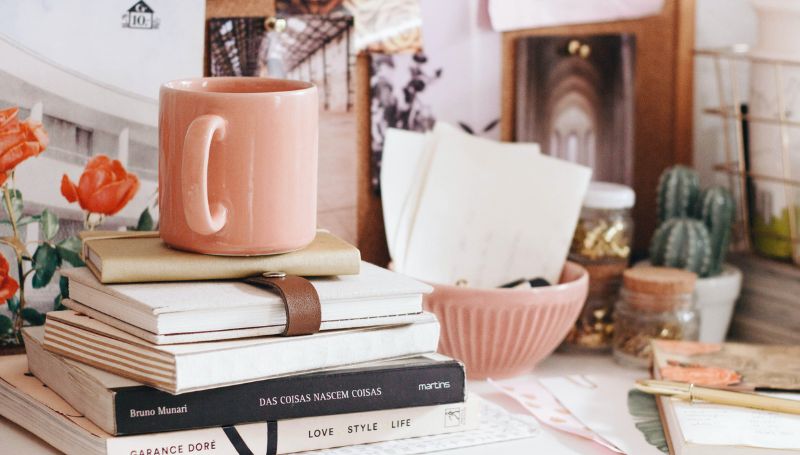 cup-books-on-desk